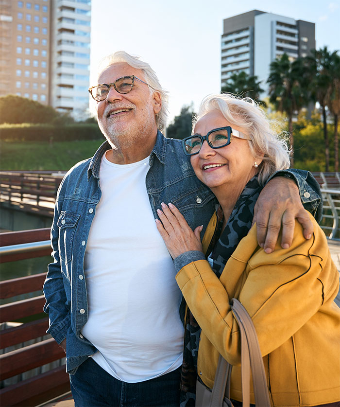 senior-couple-embracing-in-urban-landscape-2026-09-25-00-31-59-utc